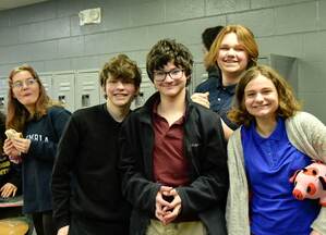 5 Jackson Preparatory & Early College middle school students smile at the camera.